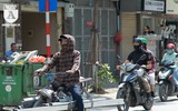 {ẢNH] Nắng nóng kéo dài, lại lo nguy cơ tai nạn giao thông cho những 